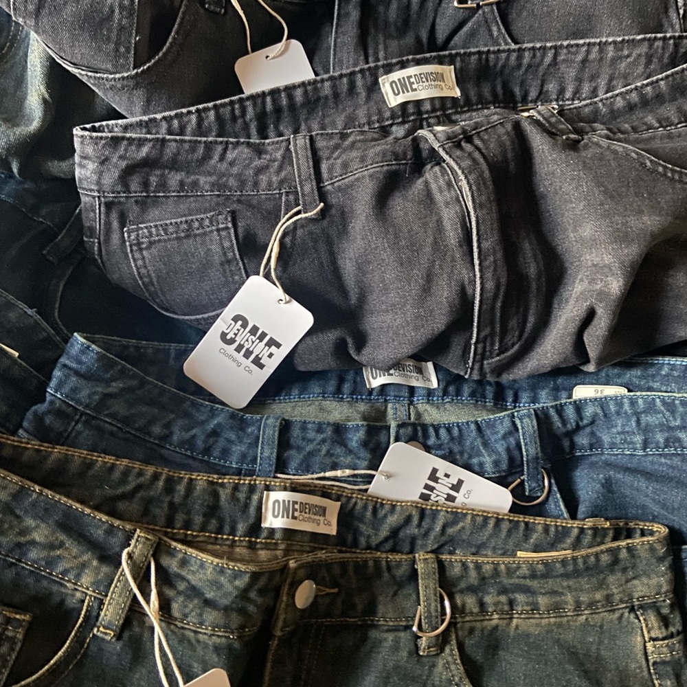 Bunch of washed jeans for sale
